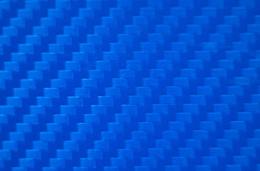 Photo of the blue carbon fiber texture. Blue vinyl film for pasting sports cars. Racing style....