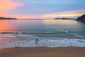 One hundred percent cloud covered sunrise over the sea