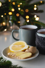 Obraz na płótnie Canvas Winter immunity boosting tea with ginger and lemon.