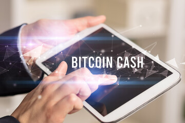 Close up hands using tablet