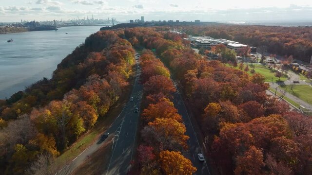 autumn flying south over Palisades Parkway towards NYC