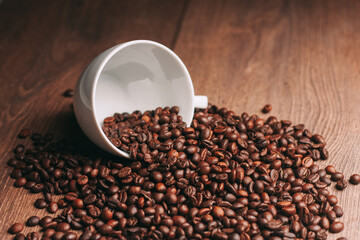 a cup of coffee Hot drink spilled grains view from above