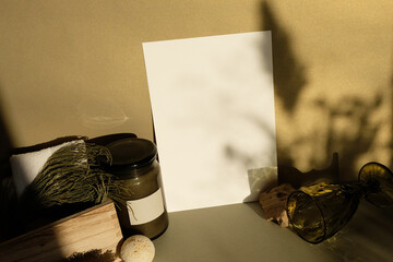 Green Gold Background White Paper Sheet Eco Branding Neutral Photo Mockup Natural Botanical Shadow, Moss Wood, Glass, Candle Jar