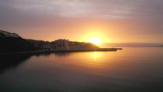 Sunrise over Torquay and Torquay Marina from a drone, Torbay, Devon, England, Europe