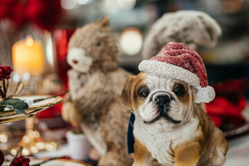 dog santa claus toy with a squirrel in the back