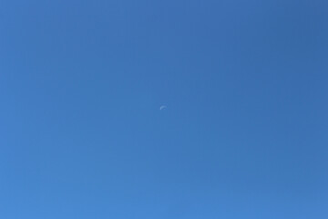 Daylight moon in clear sky