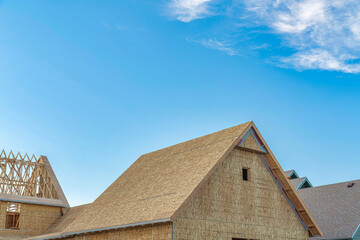 Fototapeta na wymiar Unfinished roof of a house with cork insulation at Daybreak, Utah