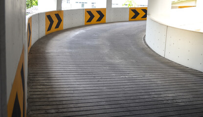 concrete pavement road in supermarket car park.patterned concrete.line on pavement concrete .curve up.floor ramp