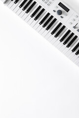 Fototapeta na wymiar Musical background with musical keys on white, flat lay, copy space.