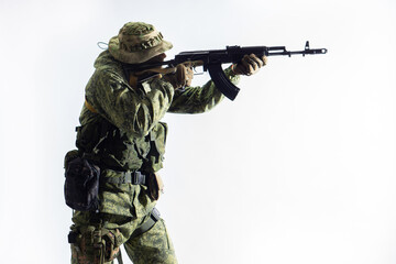 Members of the special purpose unit. A Russian special forces soldier with assault rifle aiming...