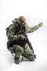 Members of the special purpose unit. A Russian special forces soldier with assault rifle aiming...