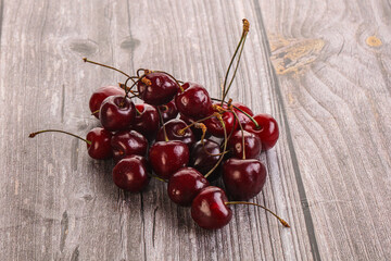 Ripe sweet cherry berries heap