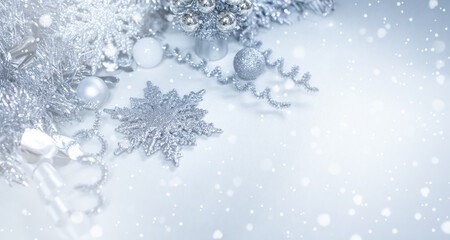 Silver Christmas gifts with snow background. silver decorations on pastel silver background. Flat lay, top view, Presents for Birthdays. Boxes with gifts tied with ribbon and bows. happy new year 2022