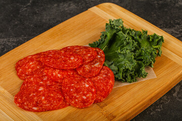 Italian spycy pepperoni sausage slices