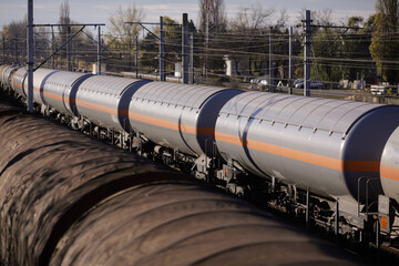 Oil, gas and liquefied petroleum gas (LPG, LP gas, or condensate) freight train wagons in a station near Bucharest, Romania.