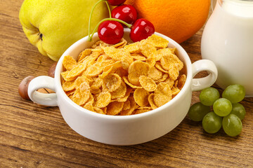 Breakfast with corn flakes and milk