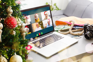 Virtual Christmas day house party. video conferencing Young man having video call via computer in the home office Online team gift opening conference calling.