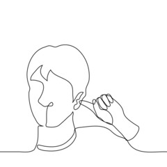 man picks his ear with his finger - one line drawing vector. the concept of improper cleaning of the auricle