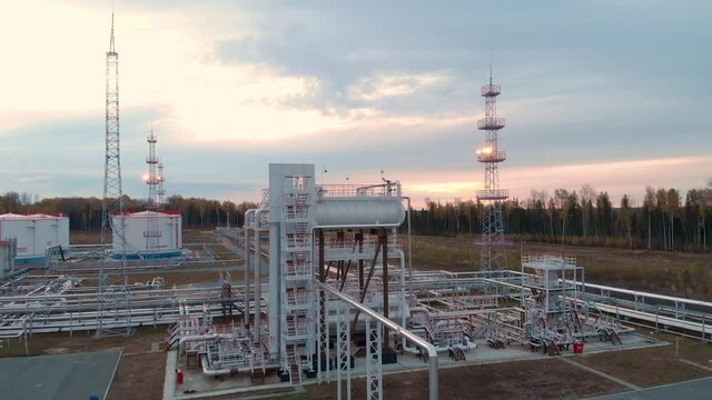 Oil and gas industry. Pipeline and Tanks for Purification and Storage of Oil and Gas. Refining of Crude Oil at the Oil Field. Flight of the Drone at the Hydrocarbon Plant.