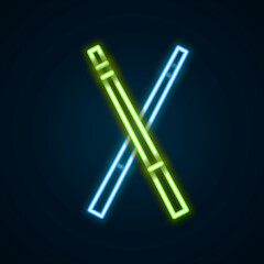 Glowing neon line Crossed billiard cues icon isolated on black background. Colorful outline concept. Vector