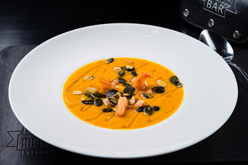 pumpkin soup with seeds and shrimp