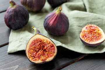 Sweet ripe figs on a dark background