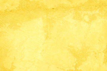 Concrete wall yellow color for texture background. Abstract grunge bright colorful color background with growing effect. Pastel yellow colored low contrast textured with roughness and irregularities.