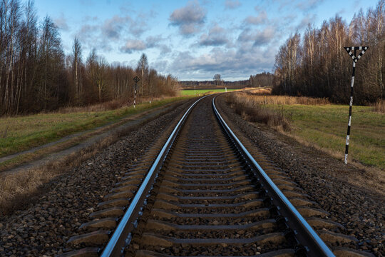Dirt road along the railway, railroad tracks
