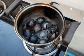 burned eggs in a pot after boiling eggs - mistake cooking.
 burn down eggs.