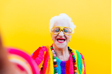 Funny grandmother portraits.granny fashion model on colored backgrounds