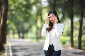 young business woman Asian person in smart suit, portrait female businesswoman outdoor