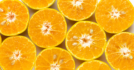Top view fresh orange slices on white background
