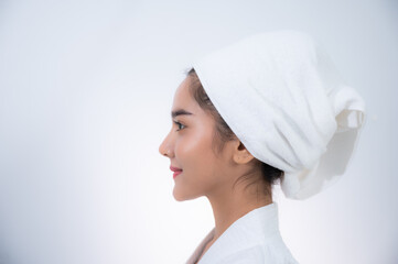 young Asian woman making treatment cosmetic beauty therapy on a face at cosmetological clinic