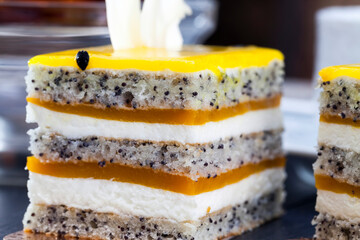 multi-layered sponge cake with poppy seeds