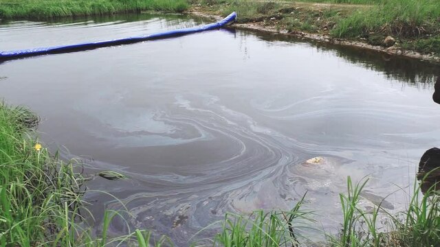 Oil booms on the reservoir.