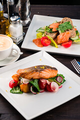 grilled salmon with vegetables on a plate