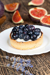 tartlet with cream and blueberries