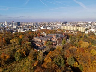 defaultAutumn panorama of the city of Lodz .Autumn  city park. Green areas of the city Top view, photo from the drone 
