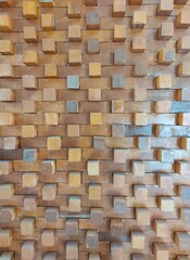 Picture of brick wall made of clay, stacked irregularly.