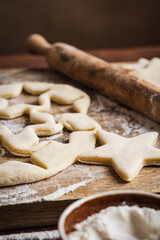 Homemade bakery making Christmas cookies, close-up. New year treat for Santa Claus cooking. Homemade bakery, xmas sweet, winter holidays concept