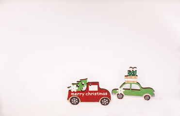 Wooden Christmas and new year toys on white background, holiday mood.