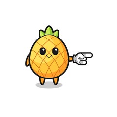 pineapple mascot with pointing right gesture