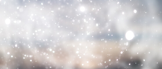 Obraz premium blue snowfall bokeh background, abstract snowflake background on blurred abstract blue