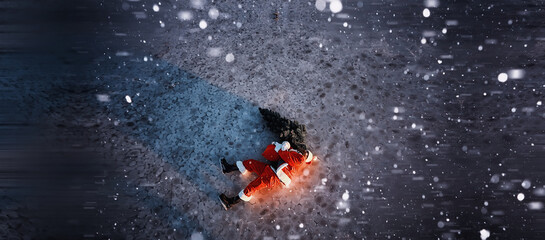 Fototapeta premium Santa Claus on ice skates goes to Christmas. Santa Claus hurries to meet the New Year with gifts and Christmas tree.