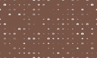 Seamless background pattern of evenly spaced white first aid symbols of different sizes and opacity. Vector illustration on brown background with stars