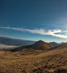 landscape with sea of clouds shot during a hike in peak of Gleize, Champsaur, french alps