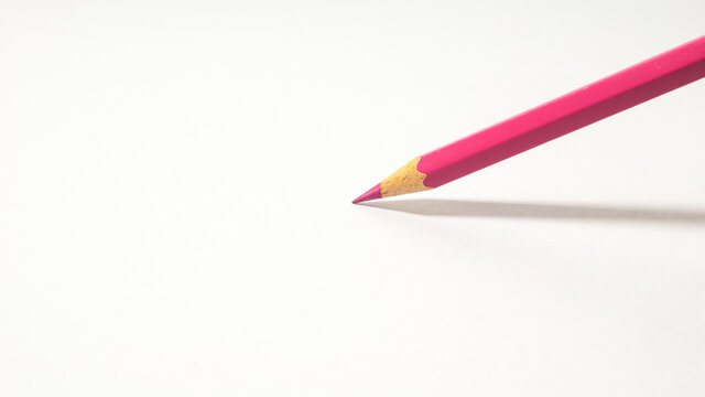 Pencils pink. brightly colored pencils placed creatively on a white background.concept art design copy space school and office