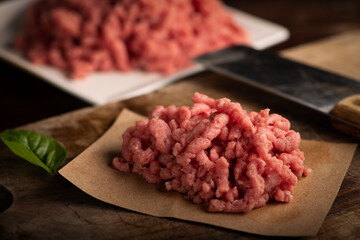 Fresh Minced Meat on vintage wooden background