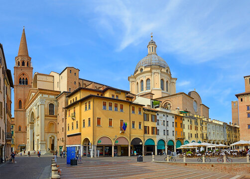 Piazza delle Erbe in Mantua downtown with the Basilica and Cathedral of Sant'Andrea  - Mantua, Lombardy, Italy. Mantova is UNESCO World Heritage Site Lombardy, Italy, Europe.