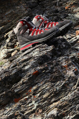 Obraz premium Quality women's mountain boots. Rock climbing.